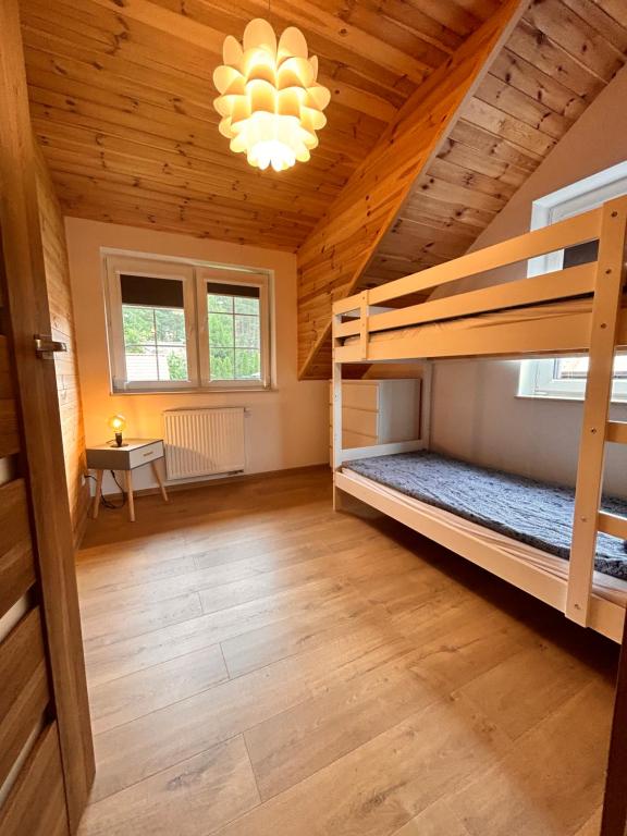 Posteľ alebo postele v izbe v ubytovaní I - Apartament na Warmi dla rodzin z dziećmi