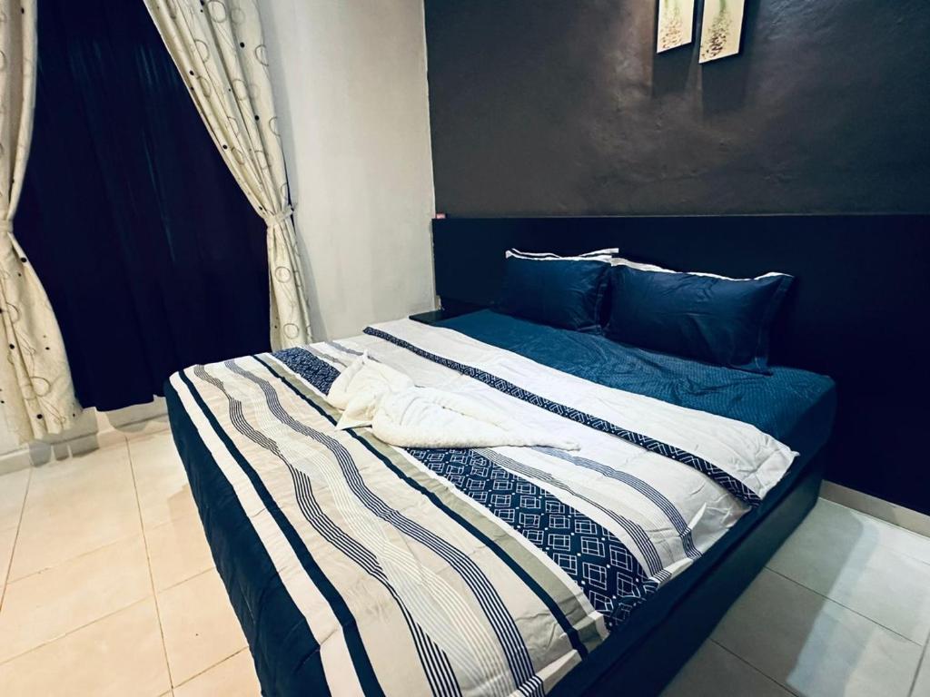 Postel nebo postele na pokoji v ubytování Kuu Inn Motel