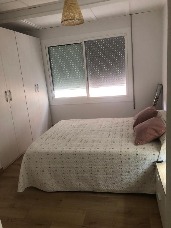 Postel nebo postele na pokoji v ubytování LA PEPITA