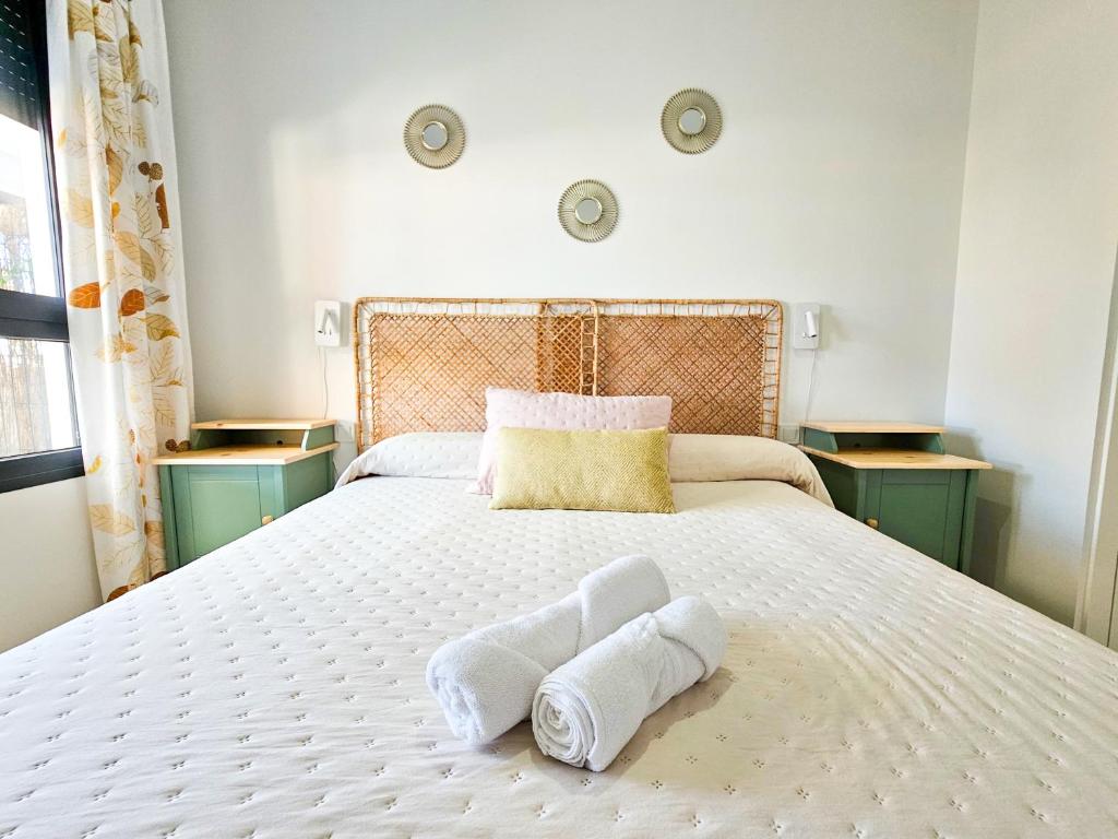 Łóżko lub łóżka w pokoju w obiekcie Terrace Mares de Benajarafe