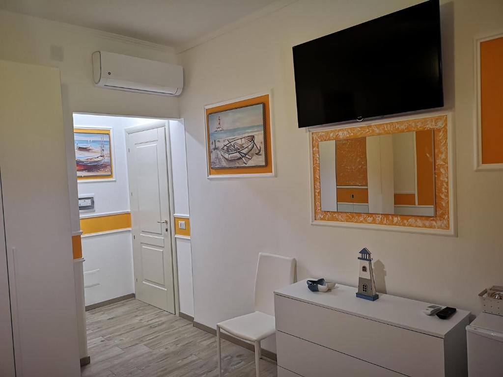 Telewizja i/lub zestaw kina domowego w obiekcie La Casa di Alfonso
