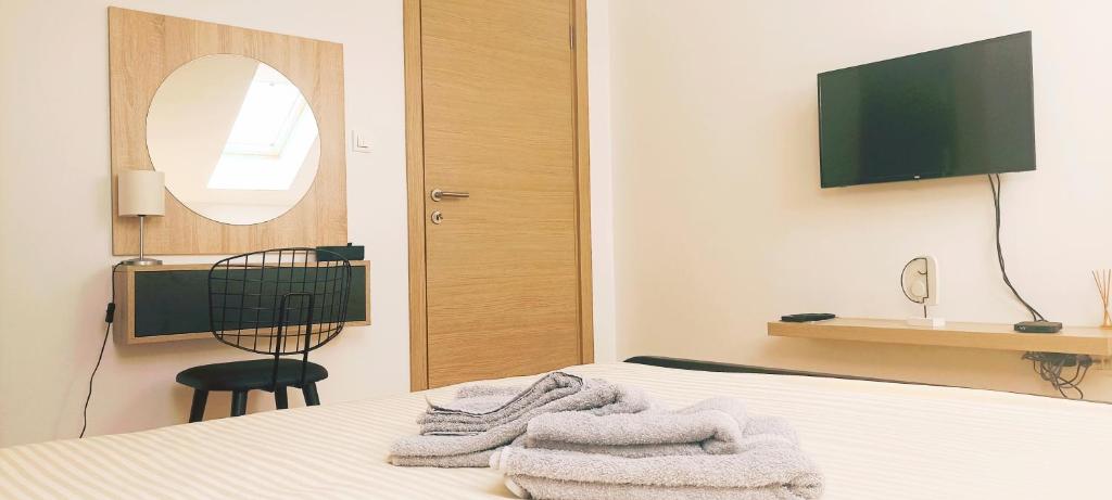Postel nebo postele na pokoji v ubytování Apartman Blagojevic Hill
