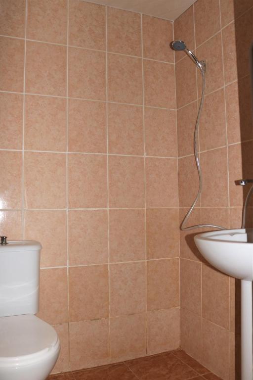 Koupelna v ubytování Taoskari Hotel