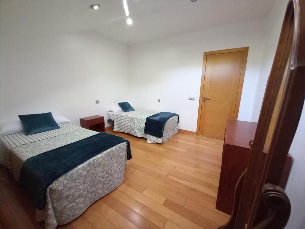 Postel nebo postele na pokoji v ubytování A de Bego