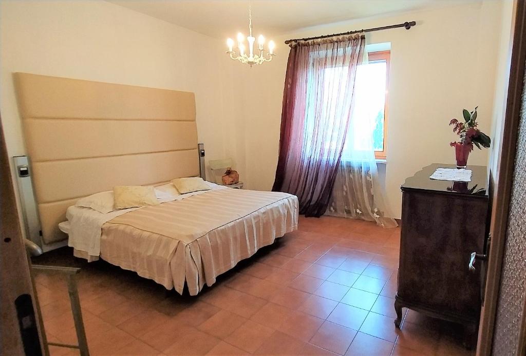 Giường trong phòng chung tại Casa Agnese Verona appartamento parcheggio in struttura