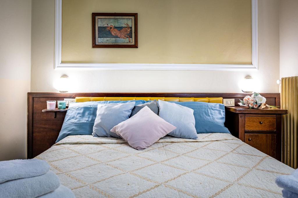 Postel nebo postele na pokoji v ubytování Hotel Minerva