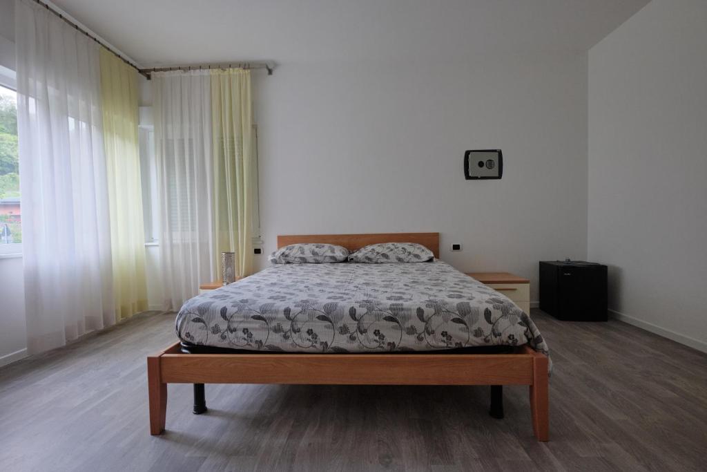 Postel nebo postele na pokoji v ubytování B&B DIVINO