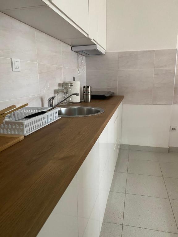 Kuchyň nebo kuchyňský kout v ubytování Lilien apartman