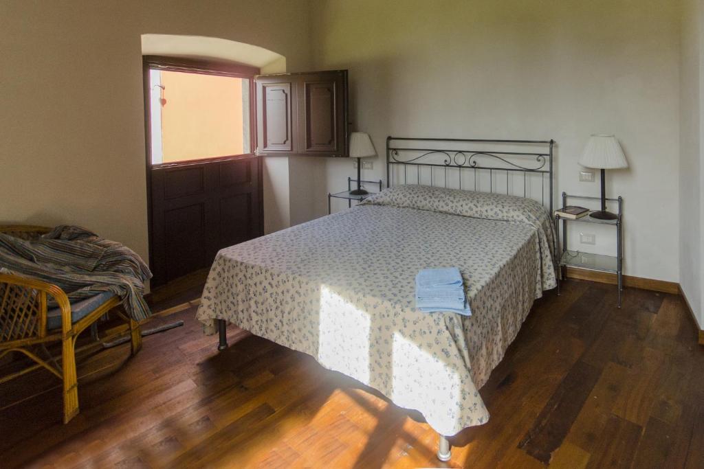 Łóżko lub łóżka w pokoju w obiekcie Villa Sardini
