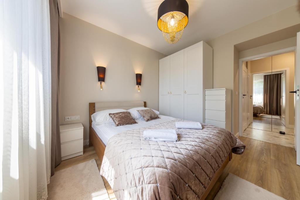 Postel nebo postele na pokoji v ubytování Apartament Luxury Two-bedroom