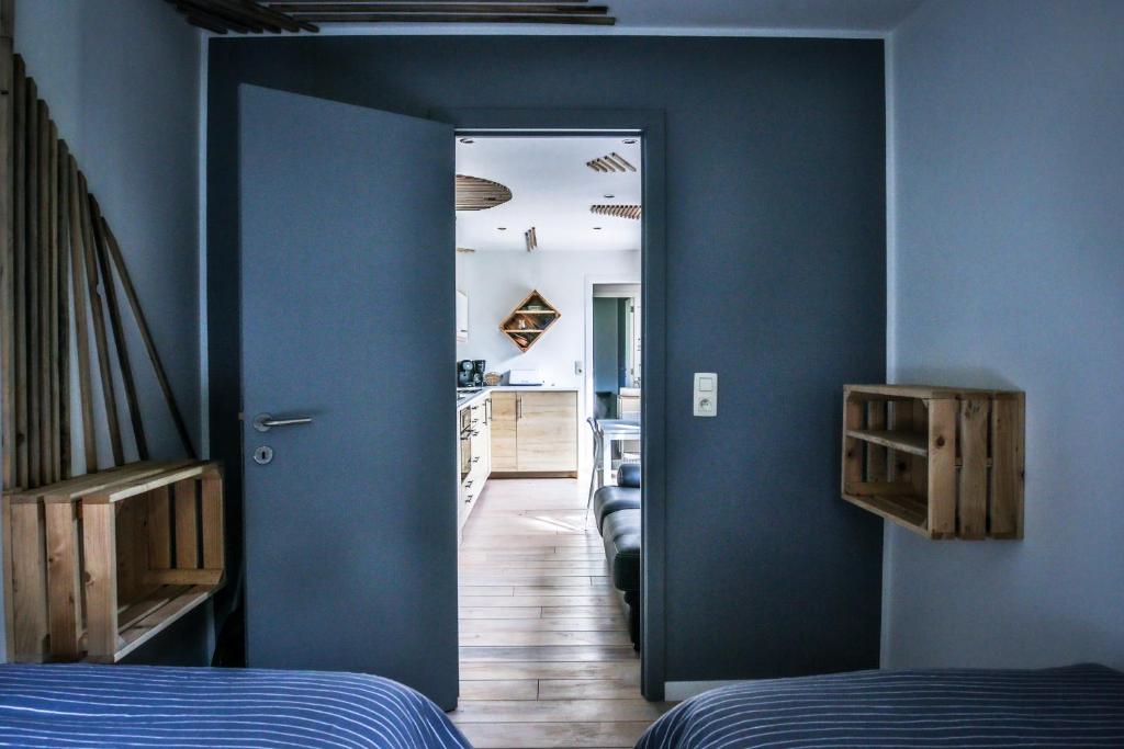 Postel nebo postele na pokoji v ubytování Tinyhouses - Domain "La vallée des Prés"