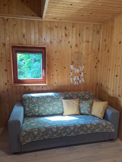 Posezení v ubytování Wooden house Ažbe