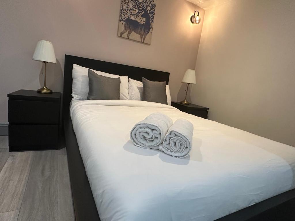 Ένα ή περισσότερα κρεβάτια σε δωμάτιο στο Guest&Rest 1