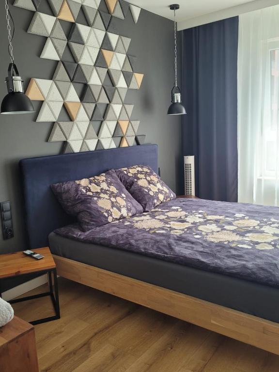 Posteľ alebo postele v izbe v ubytovaní Apartament Małopanewska Wrocław Centrum