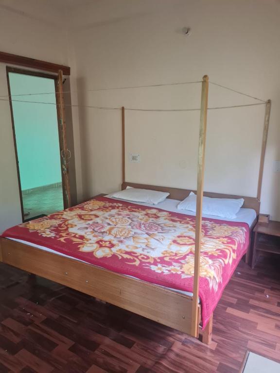 Postel nebo postele na pokoji v ubytování High Spirits Homestay and Cafe, Matuera Village, Parvati Valley