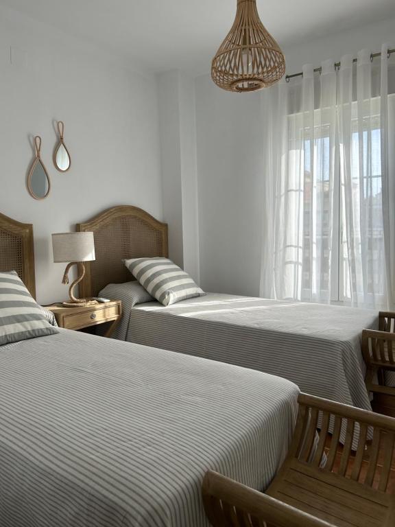 A bed or beds in a room at Sol y mar