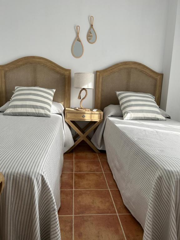 A bed or beds in a room at Sol y mar