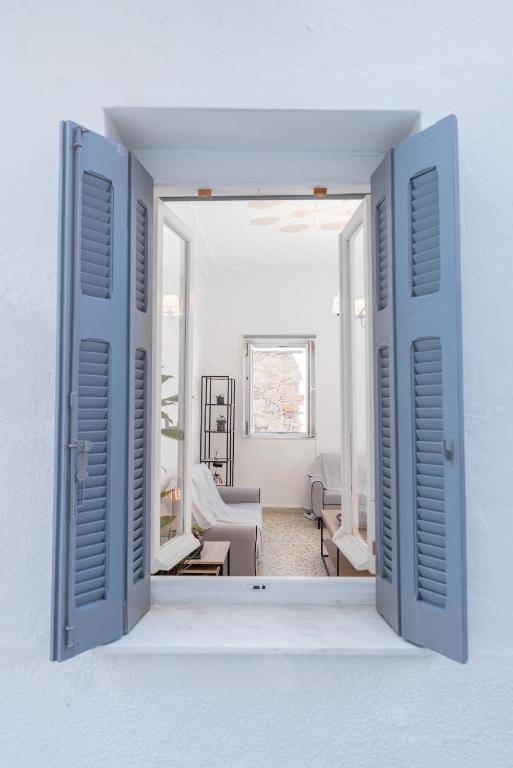 Istumisnurk majutusasutuses Syros DouBleTS Apartments