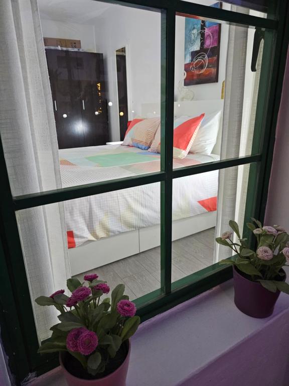 Postel nebo postele na pokoji v ubytování Lanzamar 2 bedroom