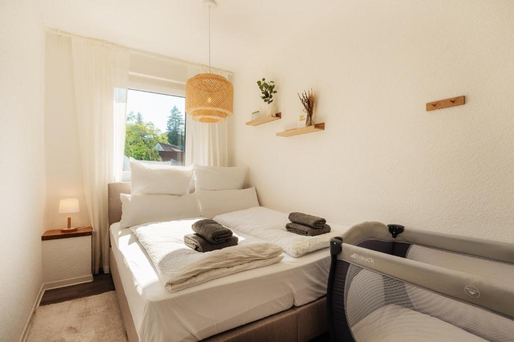 Postel nebo postele na pokoji v ubytování happyhome mitten im HARZ - direkte Wanderwege - Bachplätschern - Küche - Kinderfreundlich - Paare und Freunde