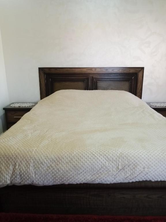 Postel nebo postele na pokoji v ubytování Jerash air apartment