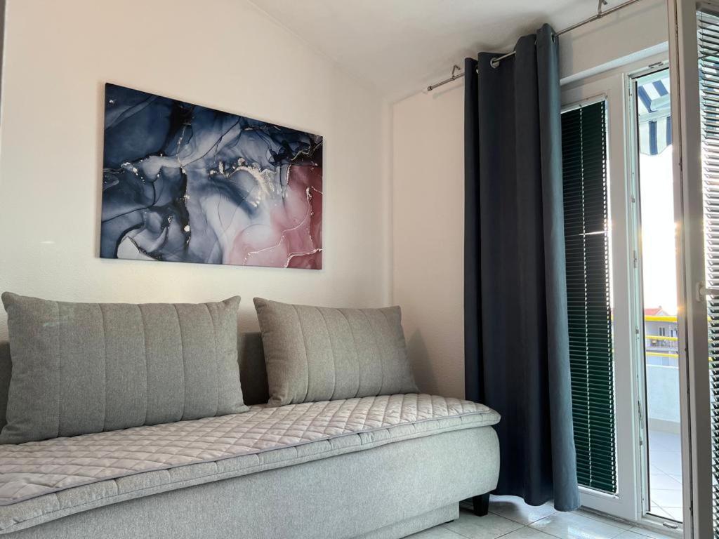 Postel nebo postele na pokoji v ubytování apartmani Natali
