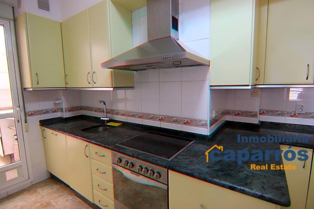 Kuchyň nebo kuchyňský kout v ubytování Apartamento Paseo del Malecón - Garrucha
