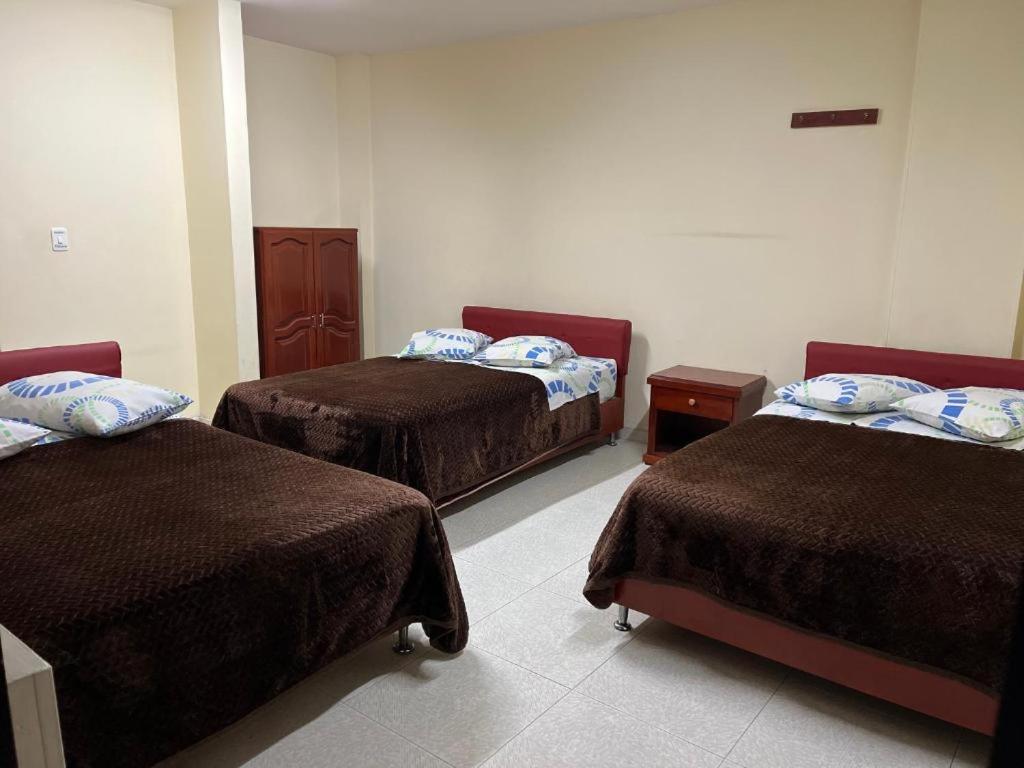 Postel nebo postele na pokoji v ubytování Hotel Vigua