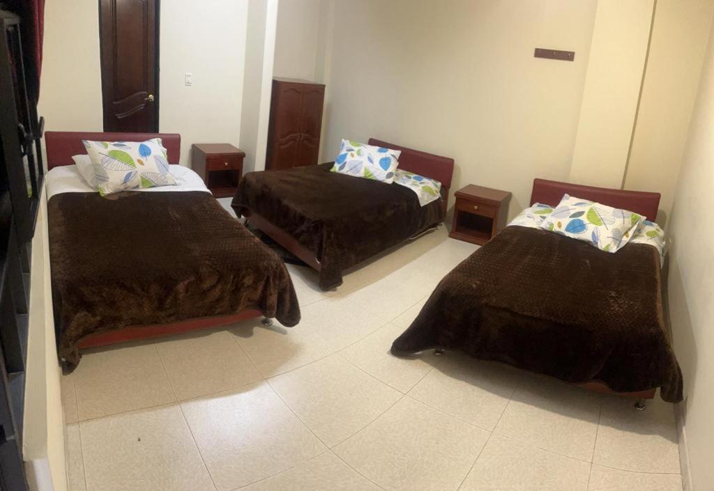 Postel nebo postele na pokoji v ubytování Hotel Vigua