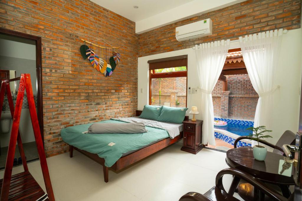 Giường trong phòng chung tại Tâm Family Homestay-Huế