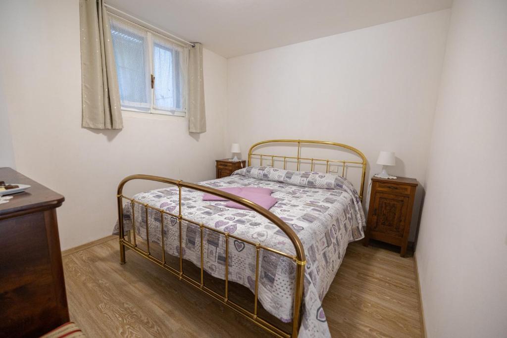 Postel nebo postele na pokoji v ubytování Casa soleggiata sull'altopiano