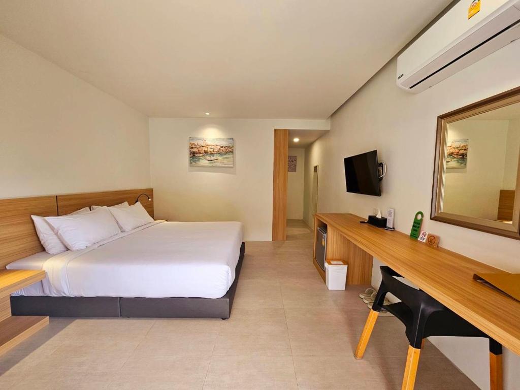 ARENICE Boutique Hotel的电视和/或娱乐中心