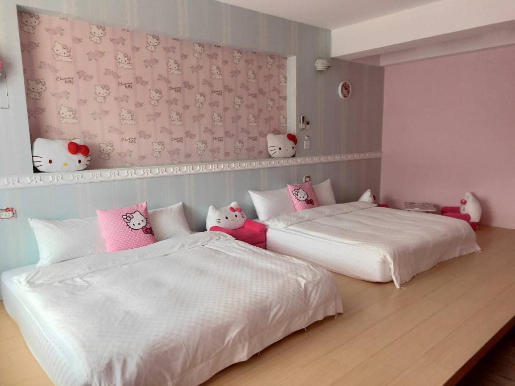 Postel nebo postele na pokoji v ubytování Qing Noise Villas
