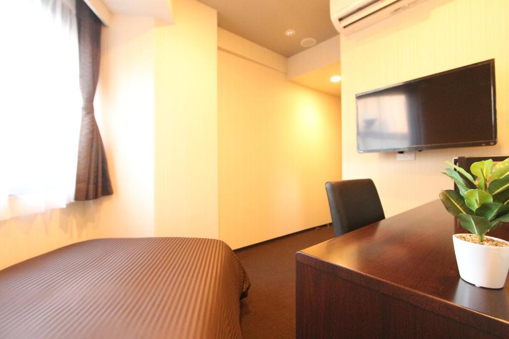 TV a/nebo společenská místnost v ubytování HOTEL LiVEMAX Nihonbashi Hakozaki