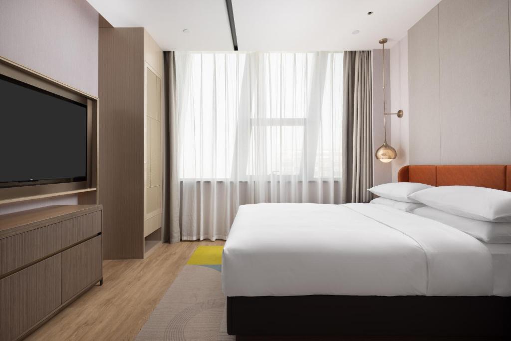 Postel nebo postele na pokoji v ubytování Home2 Suites by Hilton Beijing Shunyi