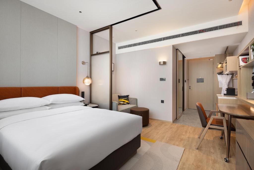 Postel nebo postele na pokoji v ubytování Home2 Suites by Hilton Beijing Shunyi