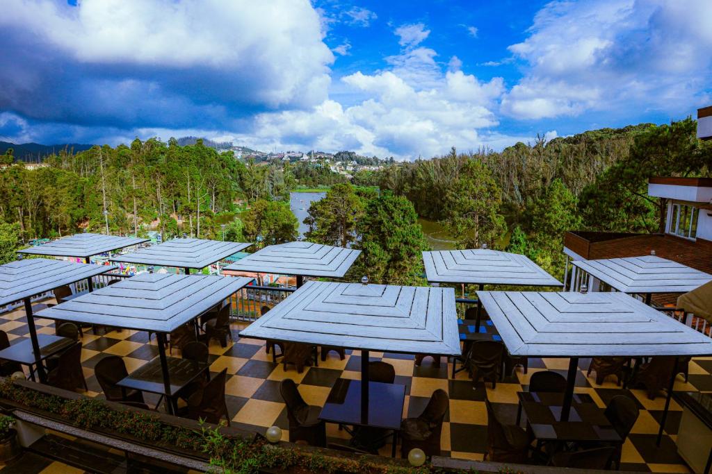 an overhead view of a group of tables and roofs at Darshan Resorts Pvt ltd in Ooty