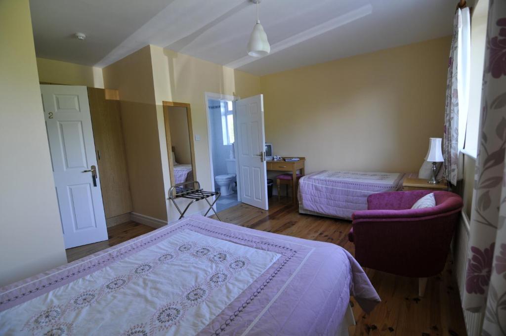 Postel nebo postele na pokoji v ubytování Carrowntober House B & B