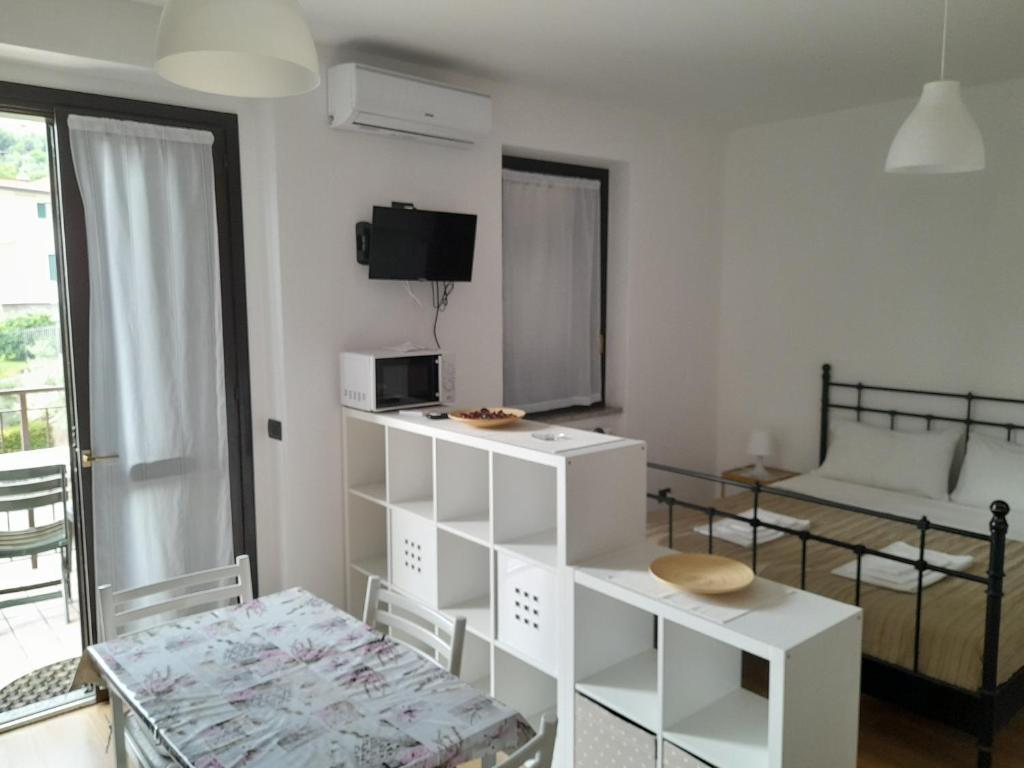 Televízia a/alebo spoločenská miestnosť v ubytovaní casa Stefania 3