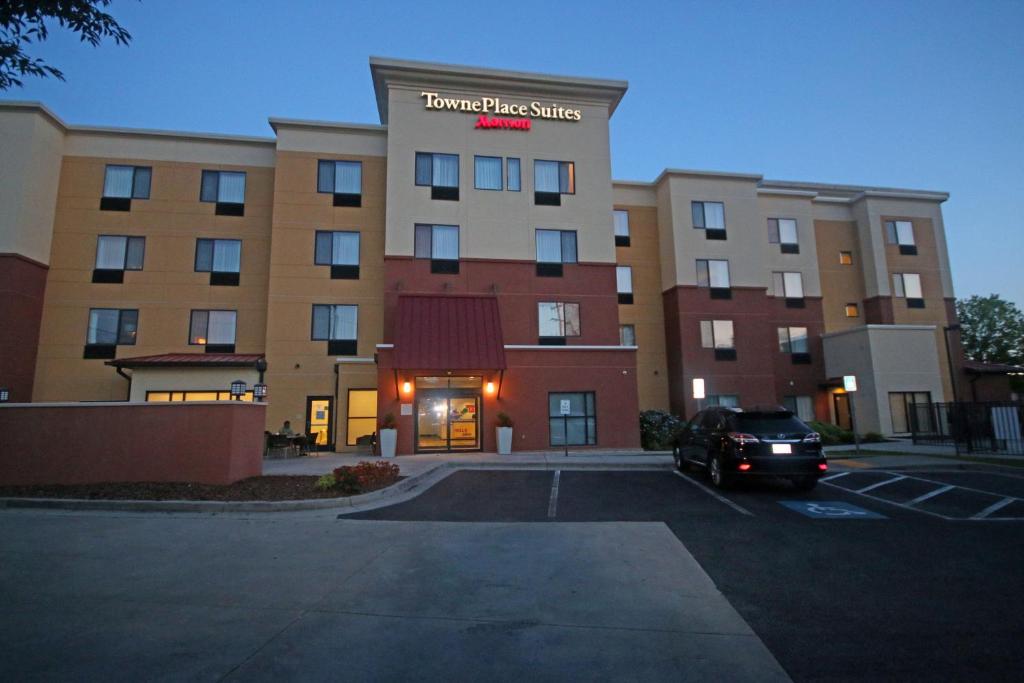 a car parked in a parking lot in front of a hotel at TownePlace Suites by Marriott Aiken Whiskey Road in Aiken