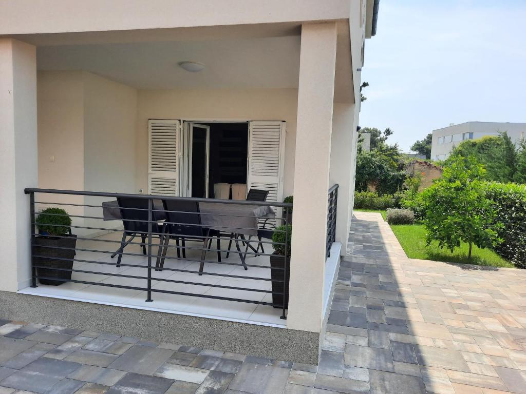 Balkón alebo terasa v ubytovaní Holiday Home Bajlo apartment with three bedrooms