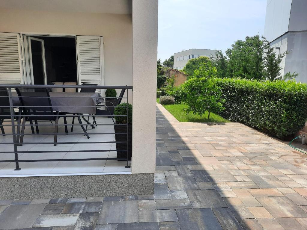 Balkón alebo terasa v ubytovaní Holiday Home Bajlo apartment with three bedrooms