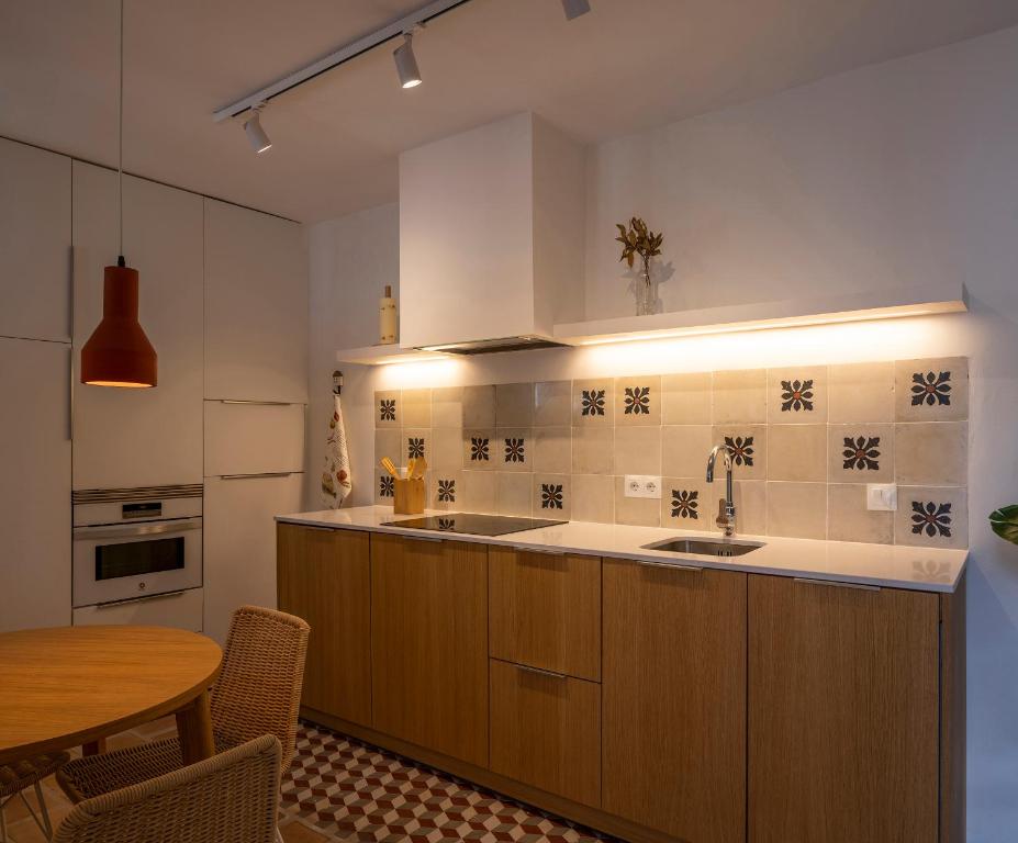 Kuchyň nebo kuchyňský kout v ubytování Carmen del Azahar by Florentia Homes