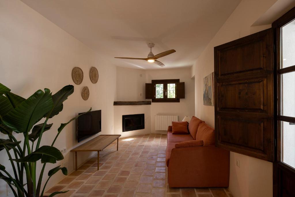 TV a/nebo společenská místnost v ubytování Carmen del Azahar by Florentia Homes