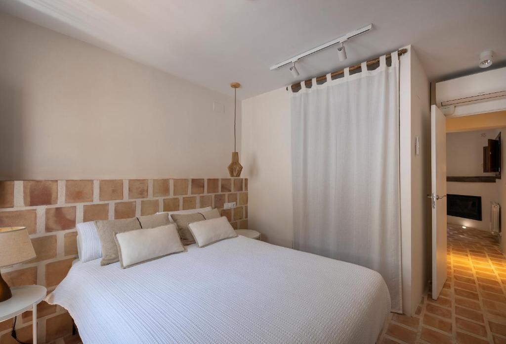 Postel nebo postele na pokoji v ubytování Carmen del Azahar by Florentia Homes