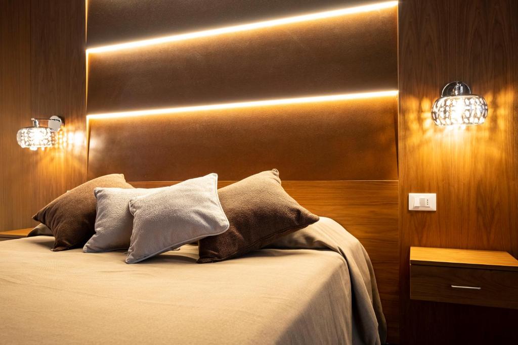 Postel nebo postele na pokoji v ubytování Hotel Mare