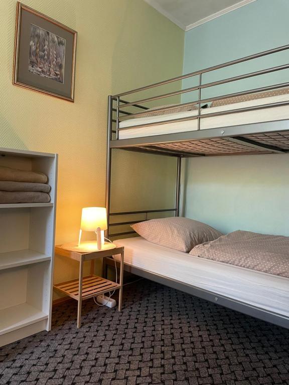 Postel nebo postele na pokoji v ubytování Mikalo House
