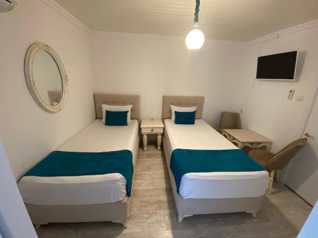 Postel nebo postele na pokoji v ubytování Otantik Shumen
