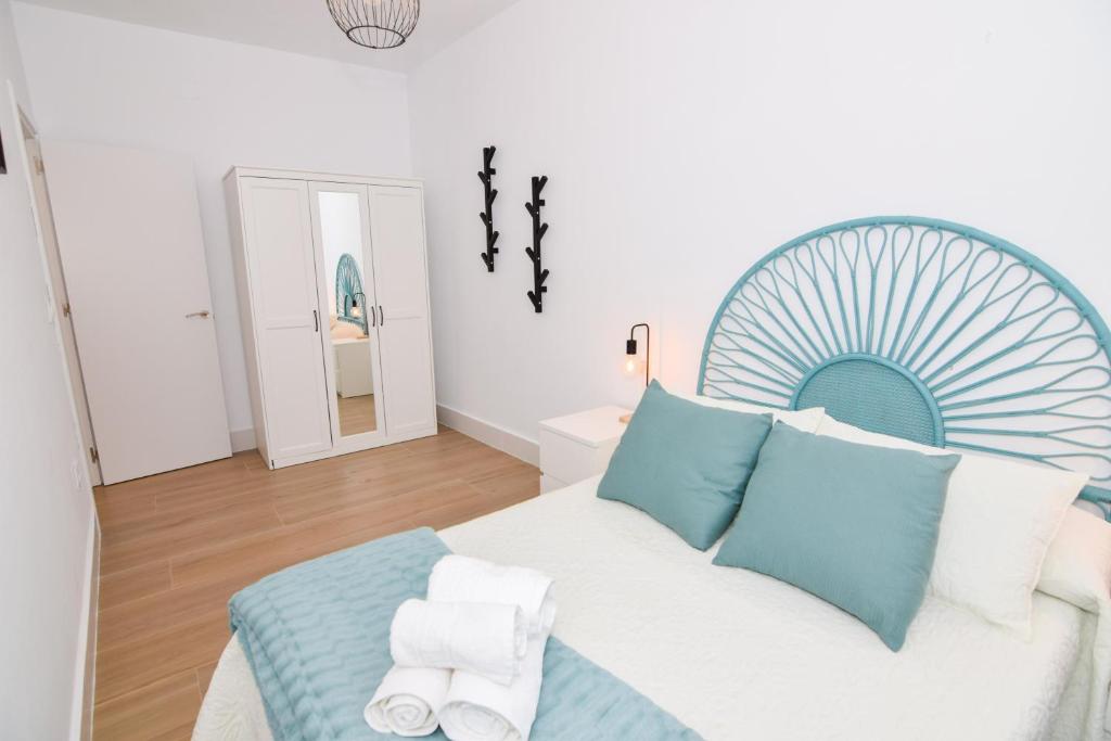Postel nebo postele na pokoji v ubytování Apartamentos Atlantida