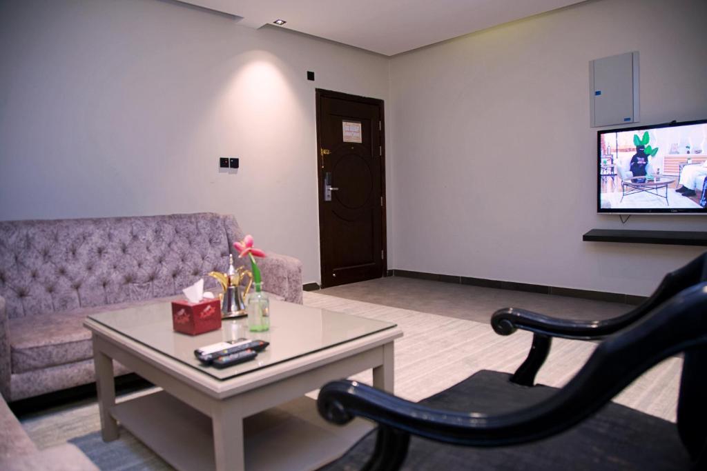 TV a/nebo společenská místnost v ubytování Sharz Hotel